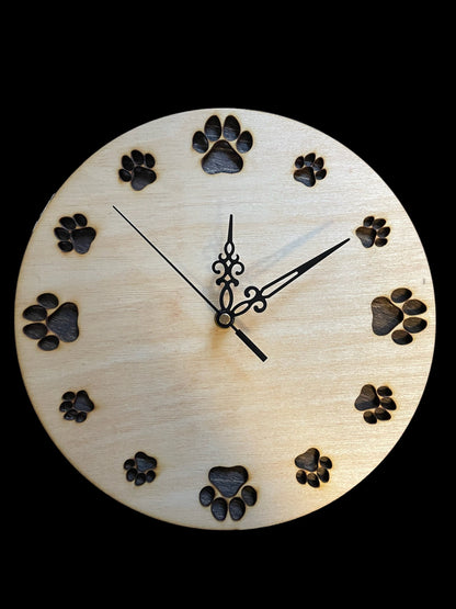 Dog Paw Clock on black background