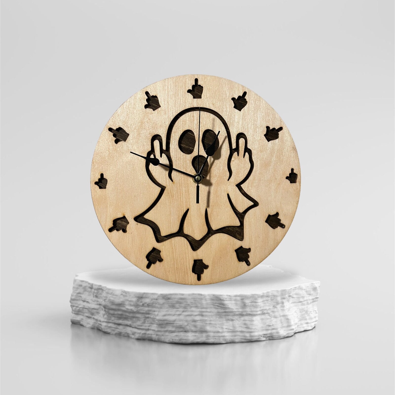 Wall Clock with ghost giving the middle finger on a white background