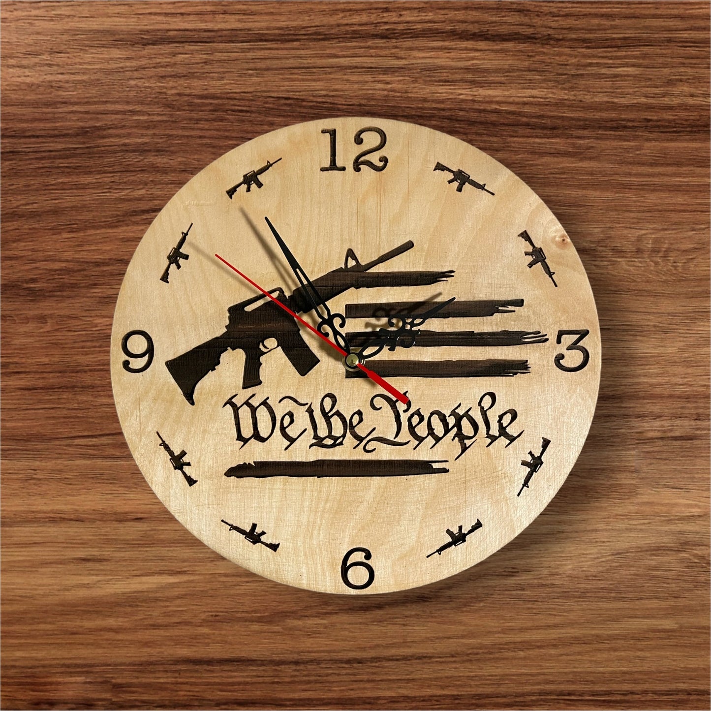 We the people clock on wood background